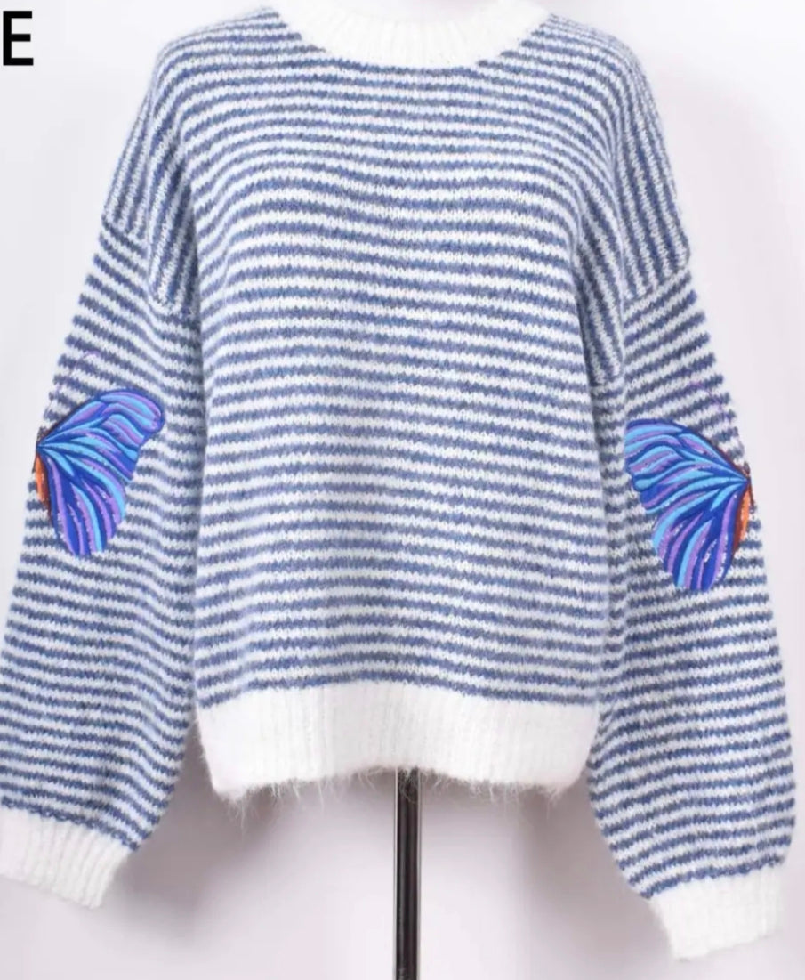 Pull rayée avec Papillon coude